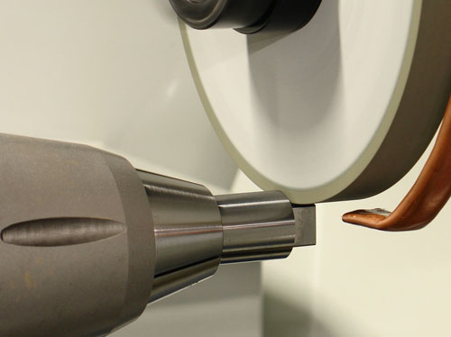 July-2010-punch-grinder-1